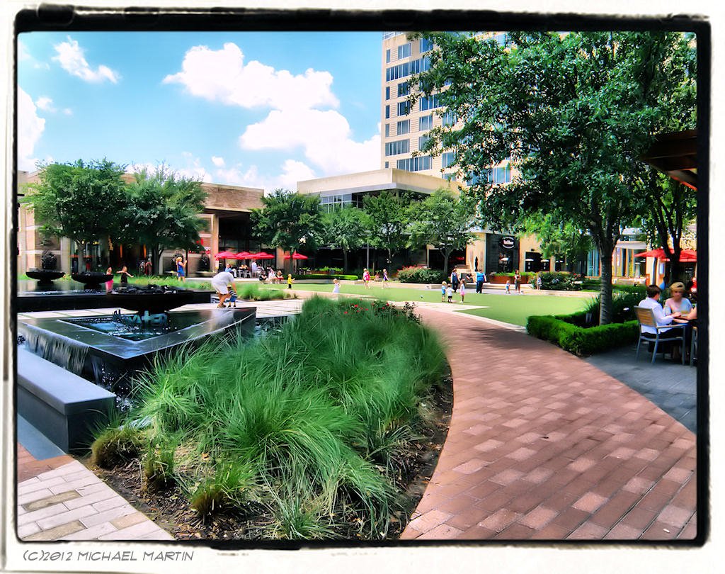 Landscaped plaza, lawn and fountains at CITYCENTRE in west Houston